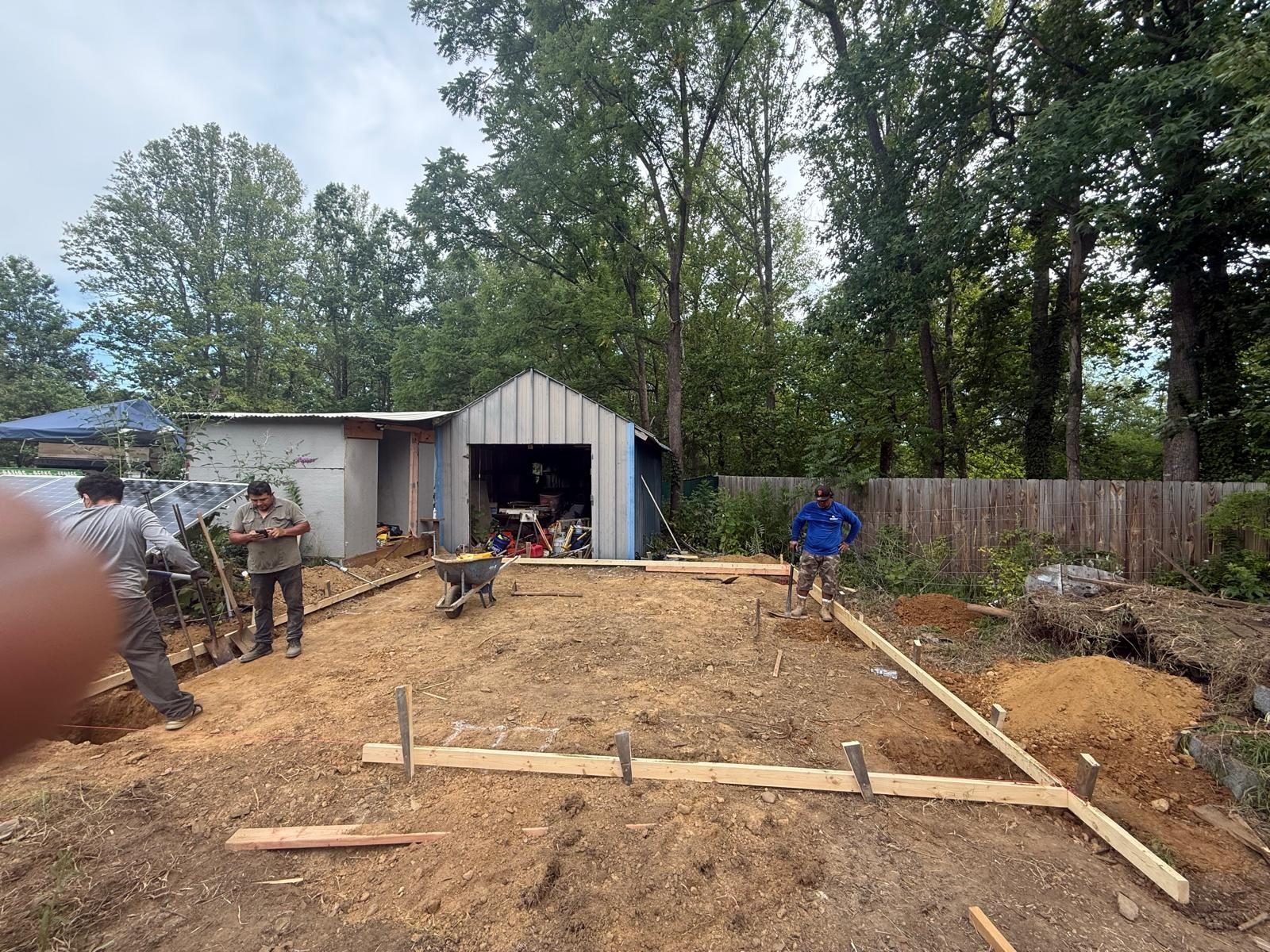 Our crew laying out a new yard project before construction begins