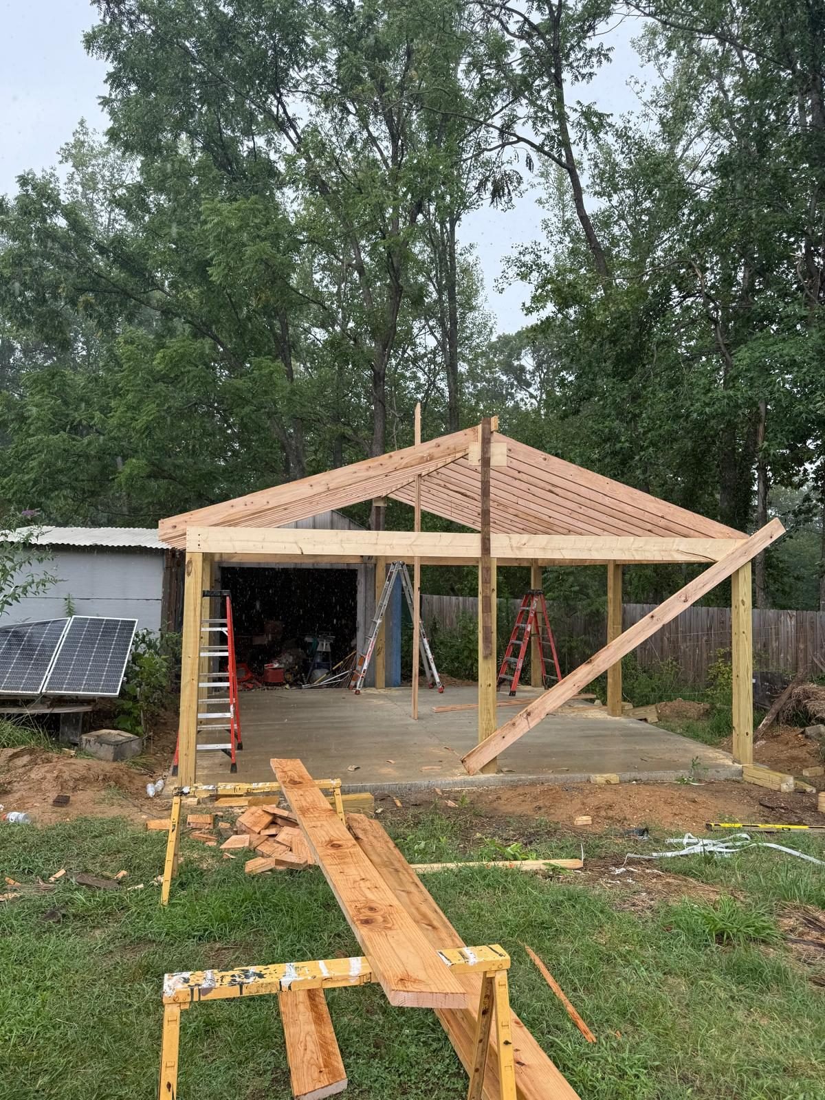 Framing a wood pavilion for a backyard gathering space
