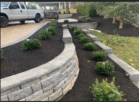 Multi-level retaining walls with mulched planting beds