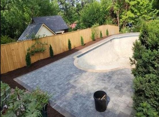 Pool patio surrounded by pavers