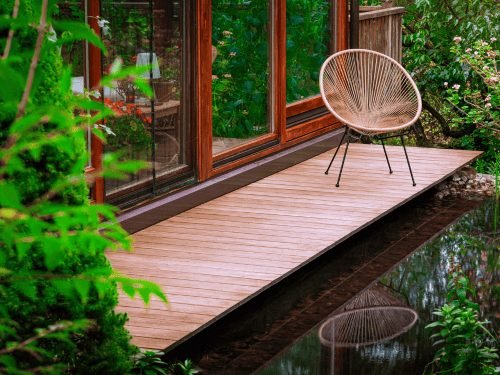 Wood deck beside a pond