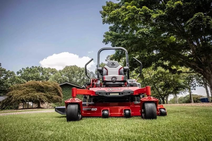 Zero-turn mower on a freshly cut lawn